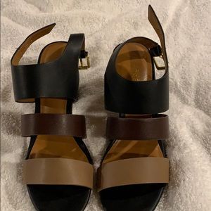 Women’s leather sandals black, brown and beige.